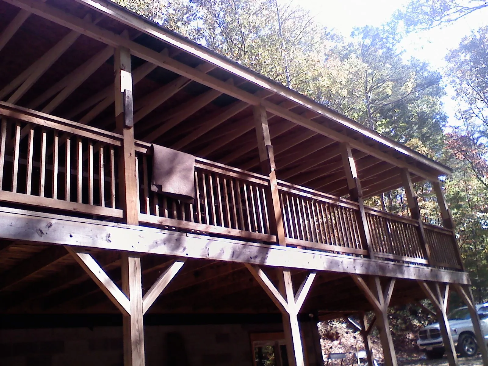 Timber framing under a new elevated porch and deck — Roof Leak Repair in Brook Park by Roofing Brothers